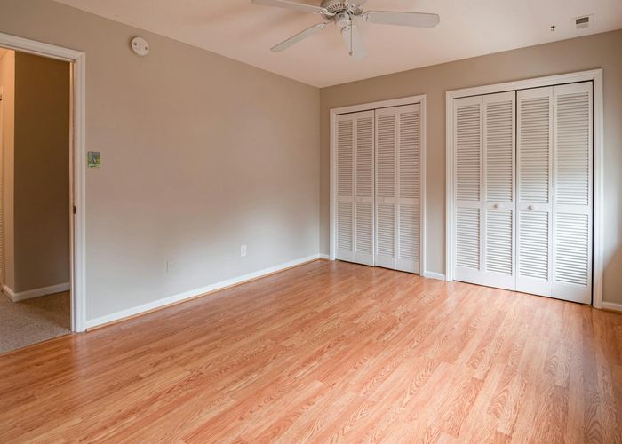 Spacious, bright room ready for a yoga session.